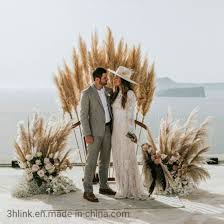 We opted for dried flowers, which my mother tirelessly arranged as well as designing the bouquets and boutonnieres for the bridal party. Natural Dried Hardy Pampas Grass Wedding Decor China Grass Wedding And Wedding Pampas Price Made In China Com
