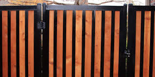 Metal gates with wood inserts. Privacy Fence With Metal Posts Frame Outlasts Wood Fencetrac