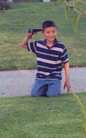 I Need Meme With Smiling Kid With Gun To His Head Meme Research Discussion Know Your Meme