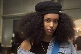 Shot Of Model At Afropunk With Long Afro Curls Wearing A Beret Afro Hairstyles Curly Hair Styles French Girl Hair