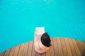 We'll go over the basics of saltwater pools: Benefits Of A Salt Water Pool Explained Well Good