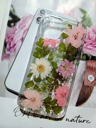 花開 現貨適用型號 apple iphone 12 iphone 12 pro 歡迎訂製 花材 乾燥花 亮粉及樹酯所製作保護殼材質 tpu軟邊 pc透明硬殼產地 製造方式產地台灣手工製作