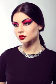 Fashion Model Portrait. Scarlet Makeup. Black Arrows. Stock Image