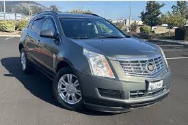 Image result for Glacier Blue 2013 SRX