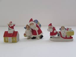 Designed and hand sculpted by the talented artists at lenox, add these works of art to your home. Three Miniature Christmas Santa Claus Figurines Etsy Miniature Christmas Miniatures Santa Claus