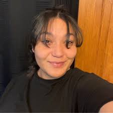 Why is it considered weird to smile and wave at strangers?