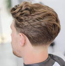 Taper Fade For Thick Wavy Hair Mens Hairstyles Medium Medium Hair Styles Wavy Hair Men