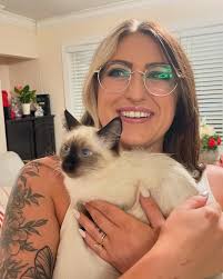 Meet Princess Fiona Fluffington (more commonly known as Fiona or Fefe lol).  She is the sweetest little baby. 🖤🖤🖤 Even Laurent loves her. 😉