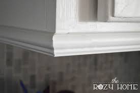 Easy And Inexpensive Cabinet Updates The 15 Minute Fix Adding Trim To The Bottom Of Cabinets The Rozy Home Update Cabinets Kitchen Cabinets Trim Kitchen Cabinet Molding