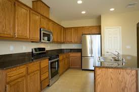 An alternative to preserving the look of oak is to take the plunge and paint your kitchen cabinets in an appealing shade. Paint Color For Kitchen With Oak Cabinets At Kitchen Sora
