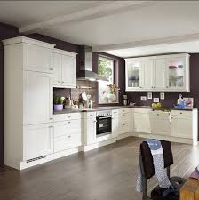 European kitchen cabinets often display a simple, unadorned style, featuring flat surfaces, little or no hardware, and flush doors. China European American Style Wooden Kitchen Cabinet China Kitchen Cabinets Kitchens