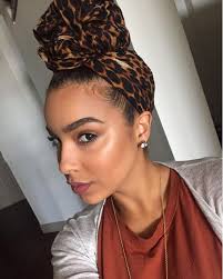A hair wrap, not to be confused with wrapping your head with a scarf, is a colorful, fun way to add a temporary creative look to your natural hair. 30 Gorgeous Photos Of Black Women Slaying On National Headwrap Day Hair Styles Scarf Hairstyles Natural Hair Styles