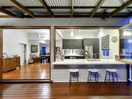 6 Tips For Turning Your Garage Into An Outdoor Kitchen Indoor Outdoor Kitchen Diy Outdoor Kitchen Outdoor Kitchen Bars