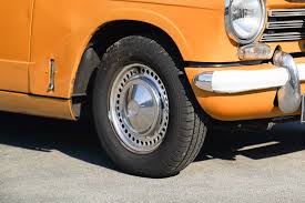 Image result for Herald Yellow 1974 Subaru