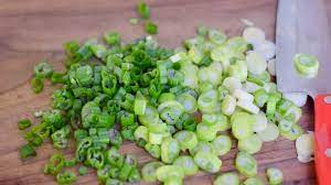Save some green by regrowing green onions in water. How To Cut Green Onions