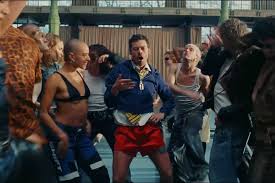 Harry Styles Gets Down to Disco and Licks Microphone in Little Red Shorts in 'Dance No More' Video