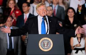 Proud boys leader henry enrique tarrio was sentenced monday to over 5 months in prison after admitting to burning a black lives matter flag and bringing rifle magazines to washington, the u.s. Enrique Tarrio Proud Boys Chairman Sits Behind President Trump At Miami Rally The Washington Post