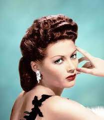 1940s Hairstyles History Of Women S Hairstyles 1940s Hairstyles Vintage Hairstyles Evening Hairstyles
