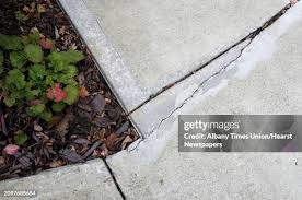 1,302 Cracked Sidewalk Stock Photos, High-Res Pictures, and Images