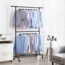 I hung everything up and wheeled it into the storage room. Double Hanging Rod Metal Clothing Rack Black Uhsr62bk Songmics Industrial Style Clothes Garment Rack On Wheels Heavy Duty Commercial Display Garment Racks Home Kitchen Fcteutonia05 De