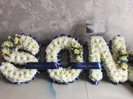 Printed ribbon for funeral wakes with photographs of your loved ones allow you to reminisce about their smile and their life whilst actually being able to see them. Personalised Wreath Ribbon