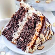 If You Love Almond Joy Candy Bars You Ll Fall For This Almond Joy Layer Cake It S A Chocolate Cake With Coconut Butte Almond Joy Almond Joy Cake Cake Recipes