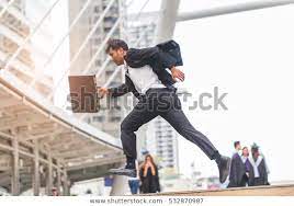 Motion Blur Businessman Holding Bag Running Stock Photo Edit Now 532870987 Business Man Women Bags Fashion Photo Editing