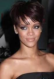 Recording artist rihanna arrives at the billboard music awards at the mgm grand garden arena in las vegas, nevada. 15 Best Rihanna Pixie Cuts