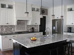 Hard, heat resistant and scratch resistant, granite is a popular choice for kitchen countertops and islands. Alaska White Granite Home Interiors And Beyond