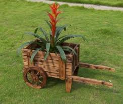 Maybe you would like to learn more about one of these? China Outdoor Novety Wheelbarrow Planter Antique Looking Cedar Wood Cart Wood Wheel China Wheelbarrow And Wooden Wheelbarrow Price