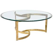 Later coffee tables were designed as low tables and this idea may have come from the ottoman empire, based on the tables in use in tea gardens. Circular Glass Coffee Table You Ll Love In 2021 Visualhunt