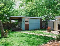 This backyard studio was created to serve as a secluded spot where people can go to paint 12. Modern Studio Luxe Kanga Room Systems