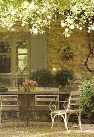 Love The Play Of The Sunlight On The Leaves Casting Lazy Lacy Dancing Shadows What A Lovely Spot To Savor A Glass Outdoor French Country Style Outdoor Rooms