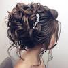 A messy bun with long curly hair is one of the best hair styling ideas when you are on the run but want to look relaxed and fresh. 3