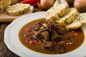 They have beer with their own very special type of cheese called nakládaný. Czech Food Cuisine In Prague Goulash Svickova Beer
