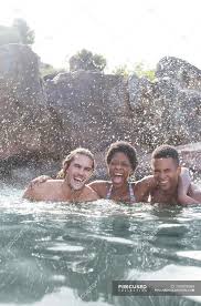 Download in under 30 seconds. Friends Laughing In River During Daytime Water Health Stock Photo 199876588