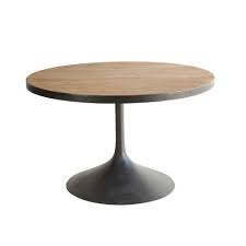 Crafted from tubular iron that gracefully drapes under the tabletop in an abstracted push and pull design, this piece will make a statement in any outdoor setting. Round Reclaimed Pine And Black Metal Logan Dining Table World Market