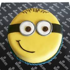 Frost a sheet cake with your favorite vanilla buttercream. Minion Cake