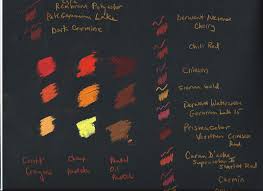 Color Comparison Chart Of Reds Oranges On Black Paper