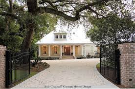 Under The Moss Rick Twilley Of Twilley Builders Built His Personal Home To Be A Shining Example Of Home Sweet Custom Home Designs House Exterior House Design