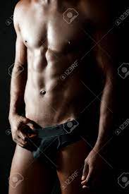 Naked Torso Of Young Muscular Man Stunning Abs Stock Photo, Picture and  Royalty Free Image. Image 13236811.