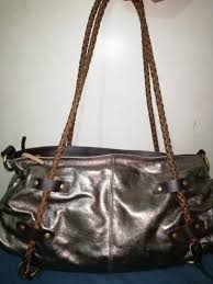 Guaranteed authentic at incredible prices! Price Drop Preloved Fiorucci Metallic Handbag Women S Fashion Bags Wallets On Carousell