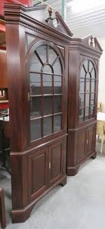 Features a cornice to the top and faux beadboard backing to the interior. Pair Of Stickley Mahogany Lighted Corner Cabinets For Sale At 1stdibs