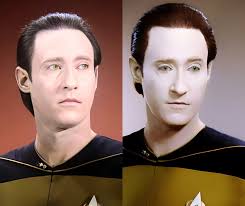 Why does Uhura wear a yellow/gold uniform in Mudd's Women?