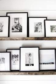 Floating shelves are a staple when it comes to easy home decor upgrades. Floating Shelf Photo Gallery Gallery Wall Shelves Gallery Wall Living Room Photo Wall Decor