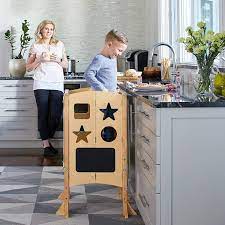 This doublewide kitchen helper stool is a uniquely foldable, lightweight step stool that helps two toddlers or young children safely reach countertop height. Amazon Com Guidecraft Classic Kitchen Helper Stool And 2 Keepers Natural Adjustable Height Kitchen Step Stool For Toddlers W Chalkboard And Whiteboard Message Boards Supports Up To 125lbs Furniture Decor