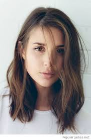 Simple White Blouse Curly Hair And Brown Eyes Hair Styles Long Hair Styles Hair Lengths