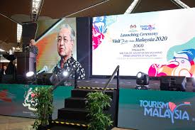 You can spot the petronas twin tower as part of the wording of visit malaysia. Visit Truly Asia Malaysia 2020 Visionkl
