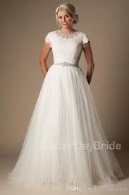 Maybe you would like to learn more about one of these? Grosshandel Kurze Armeln Bescheidene Brautkleider Mit Kappenarmeln High Neck Knopfe Lace Tull Brautkleider A Line Elegante Brautkleider Billig Von Totallymodest Braut Kleider Hochzeit Brautkleid Gunstig