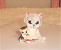 I also still have the mom cat so i have three of the total kittens that rescued that summer plus the mom cat and the rest were adopted off to family friends. Plush Rare Mama Cat With Meowing Kittens Magnetic New In Box Rare Grey Kitty Other Stuffed Animals Toys Hobbies
